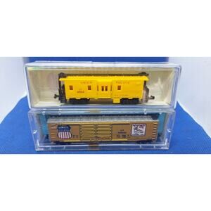 2) N scale train cars- 3124 Caboose & 2333 UP box car- never played with- Mint!